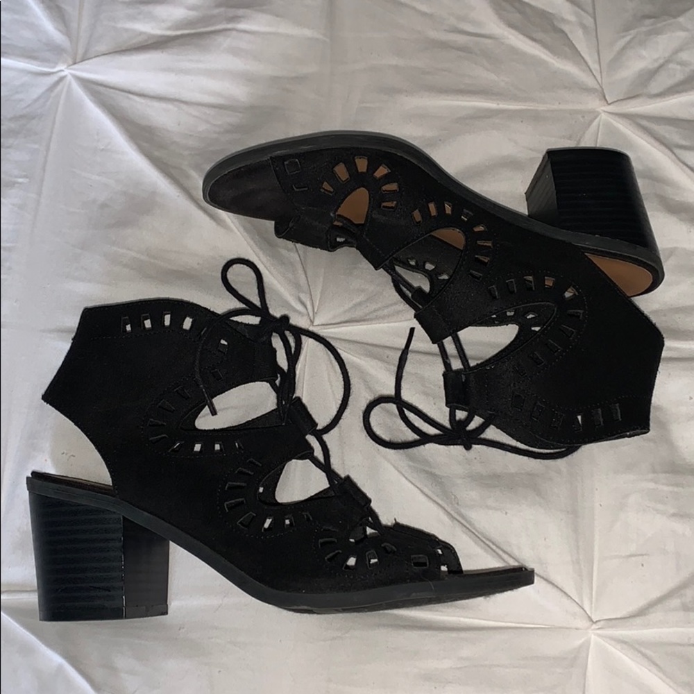 Black heels with lace up detailing